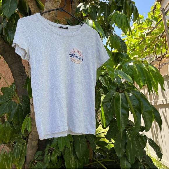 Brandy Melville Tops - Brandy Melville grey tee that reads “ Malibu California locals only” !
